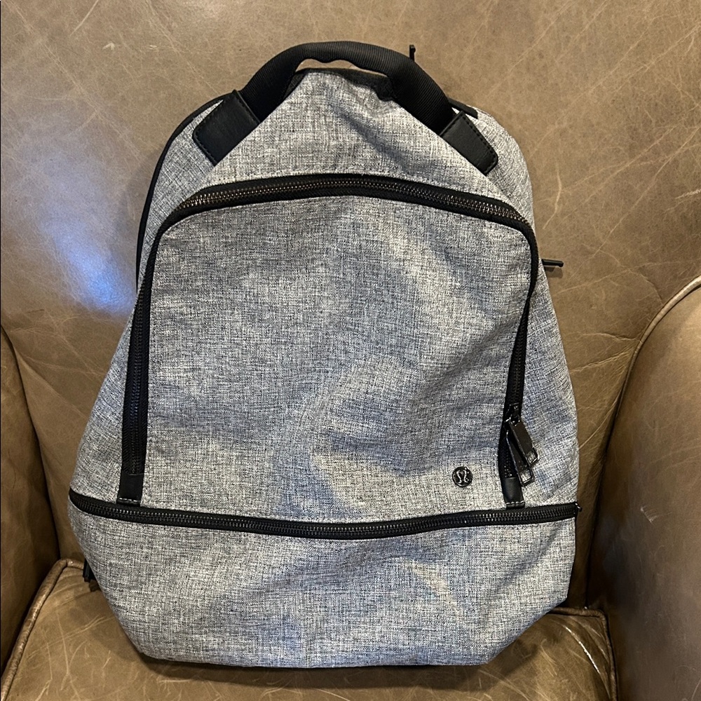 Lululemon Gray Backpack with Black Accents
Never used!!  NWOT